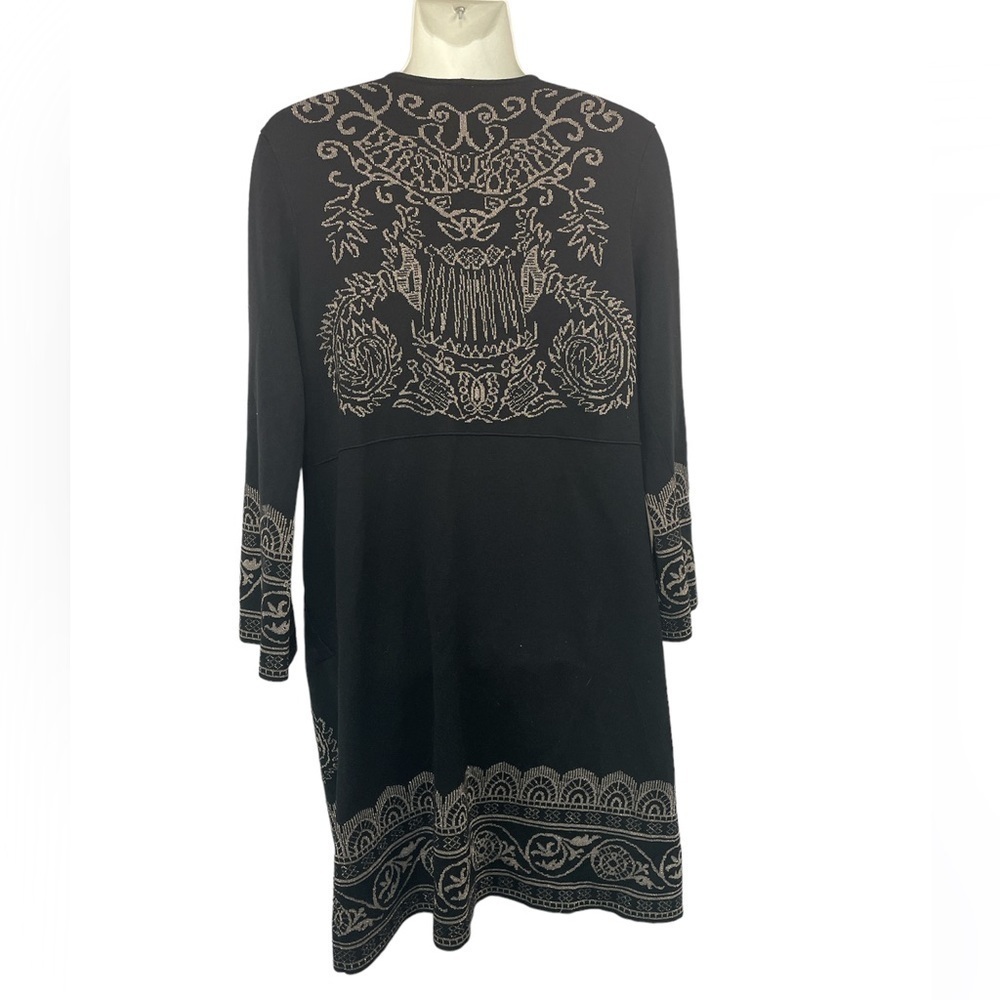 Chicos long sweater with pockets and hook/eye closure.